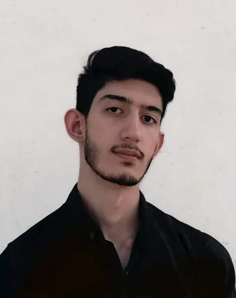 Portrait of Hadi Jafari in a black shirt